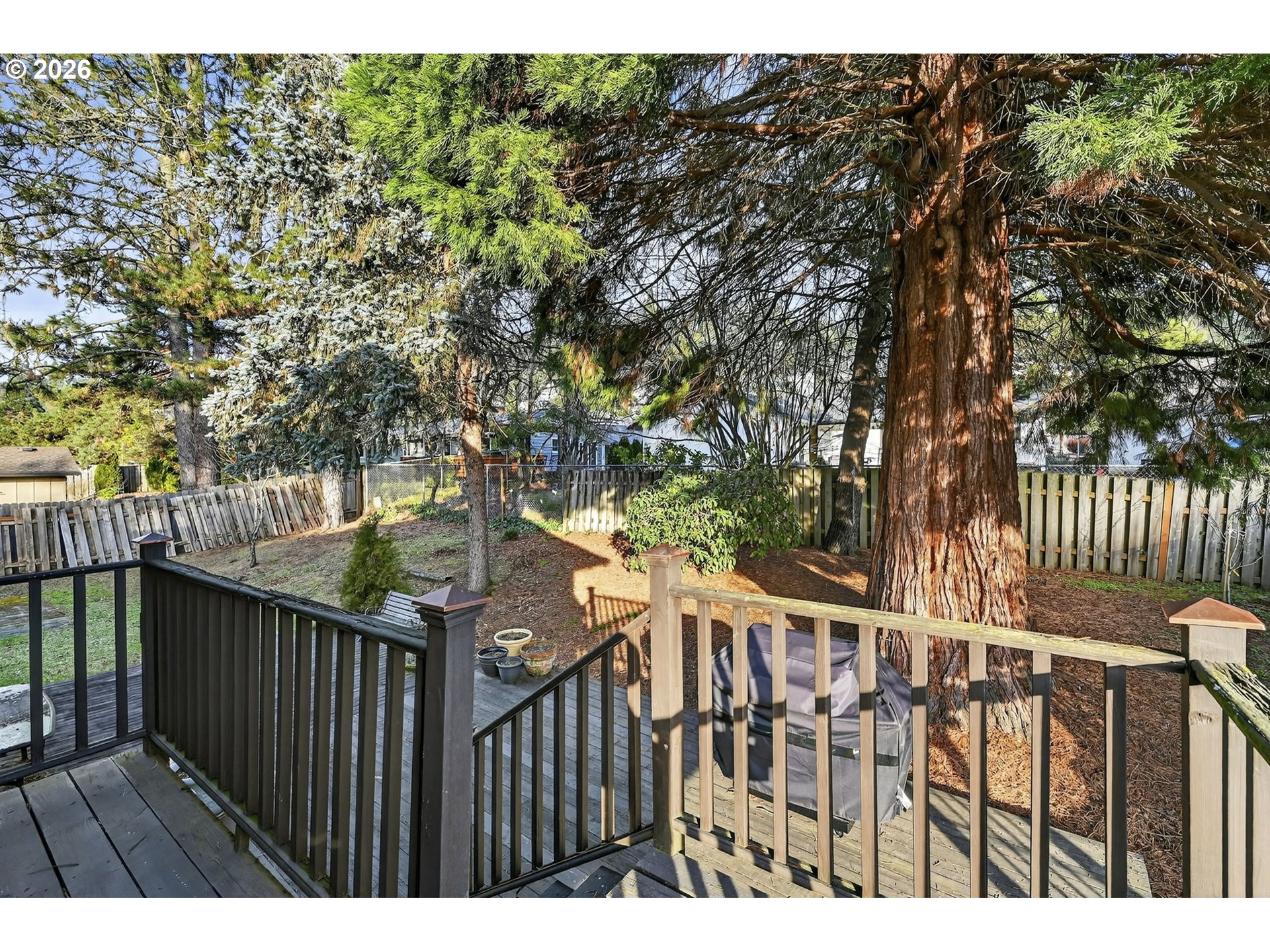 2445 Debok Road West Linn, OR 97068 - Photo 34 of 45 a view of a wooden fence