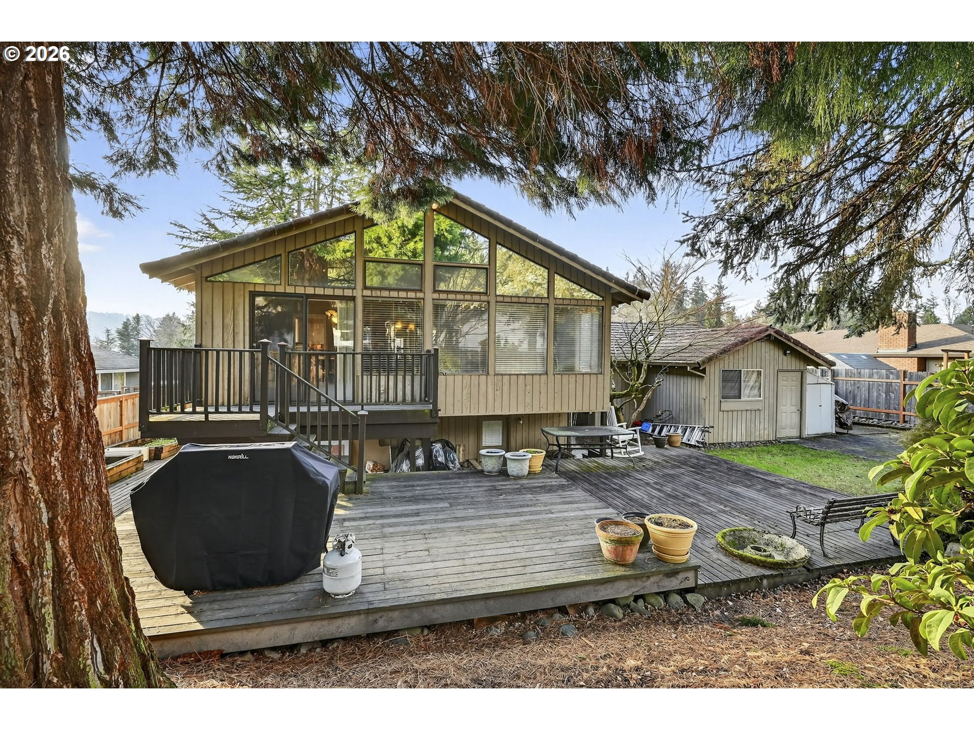 2445 Debok Road West Linn, OR 97068 - Photo 35 of 45 a view of a house with backyard and sitting area