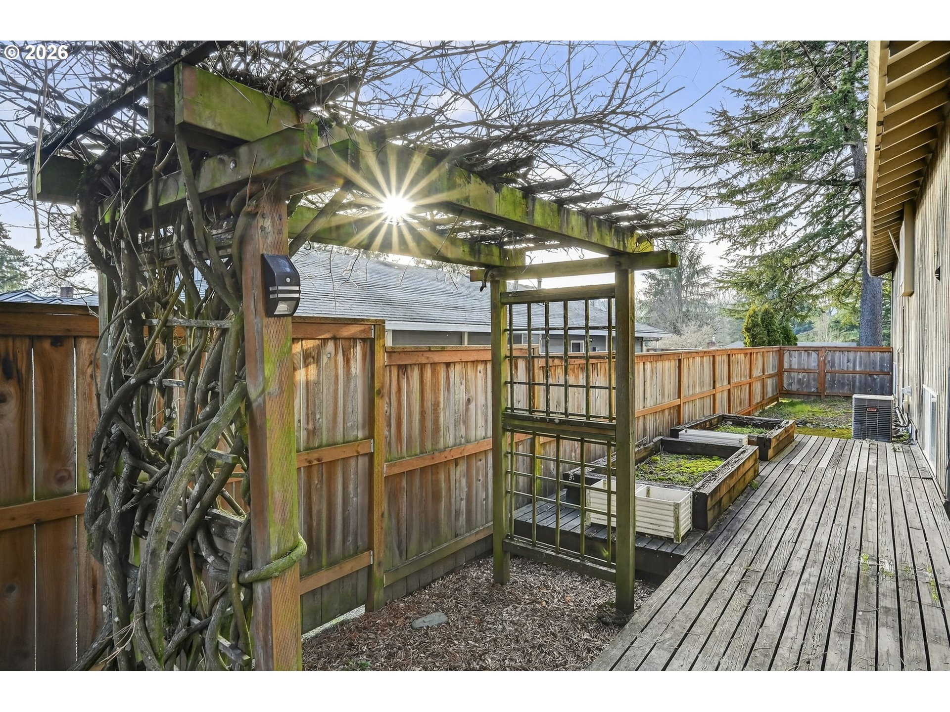 2445 Debok Road West Linn, OR 97068 - Photo 37 of 45 a view of a patio with iron fence