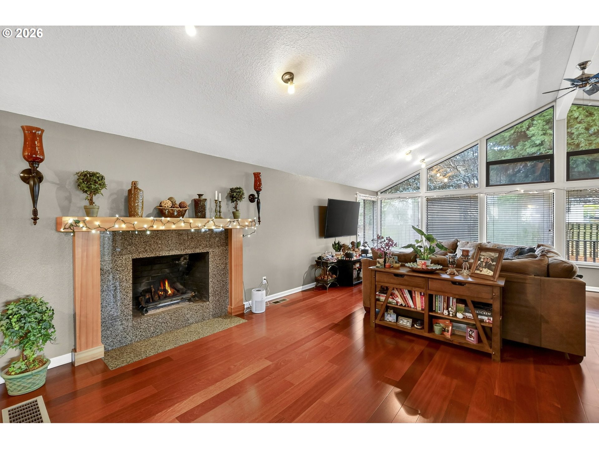 2445 Debok Road West Linn, OR 97068 - Photo 6 of 45 a living room with furniture and a fireplace