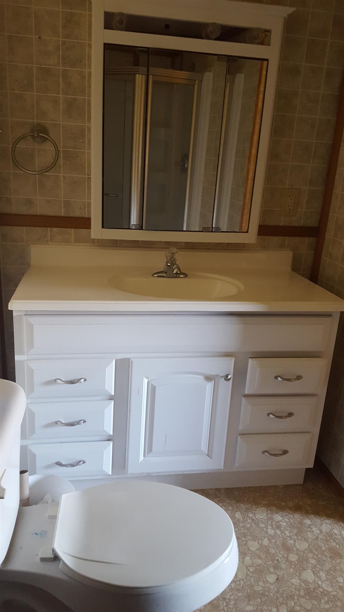 176 T G T Road Portland, TN 37148 - Photo 8 of 11 a view of cabinets