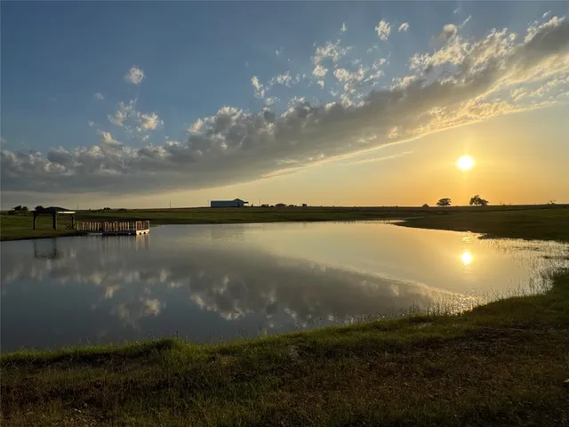a view of a lake from a yard