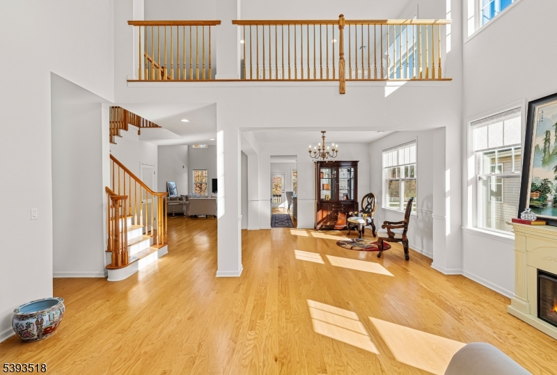 15 Potter Road Hillsborough, NJ 08844 - Photo 8 of 29 a living room with furniture and a wooden floor