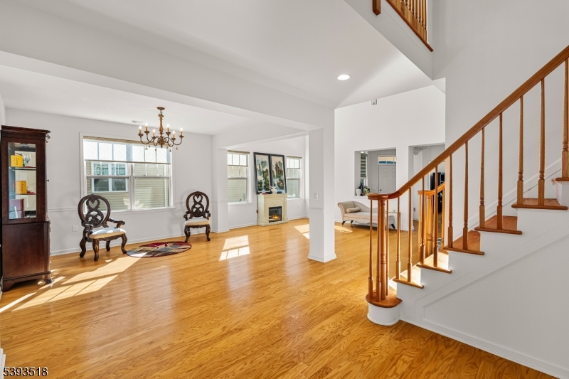 15 Potter Road Hillsborough, NJ 08844 - Photo 9 of 29 a view of an entryway with wooden floor and windows