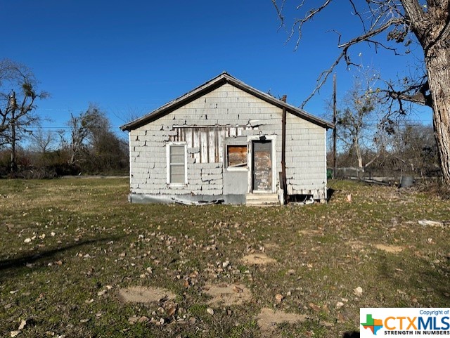1705 West 12th Street Cameron, TX 76520 - Photo 2 of 4 a view of a house with backyard