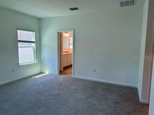 4511 Northwest 14th Loop Ocala, FL 34482 - Photo 10 of 27 an empty room with windows