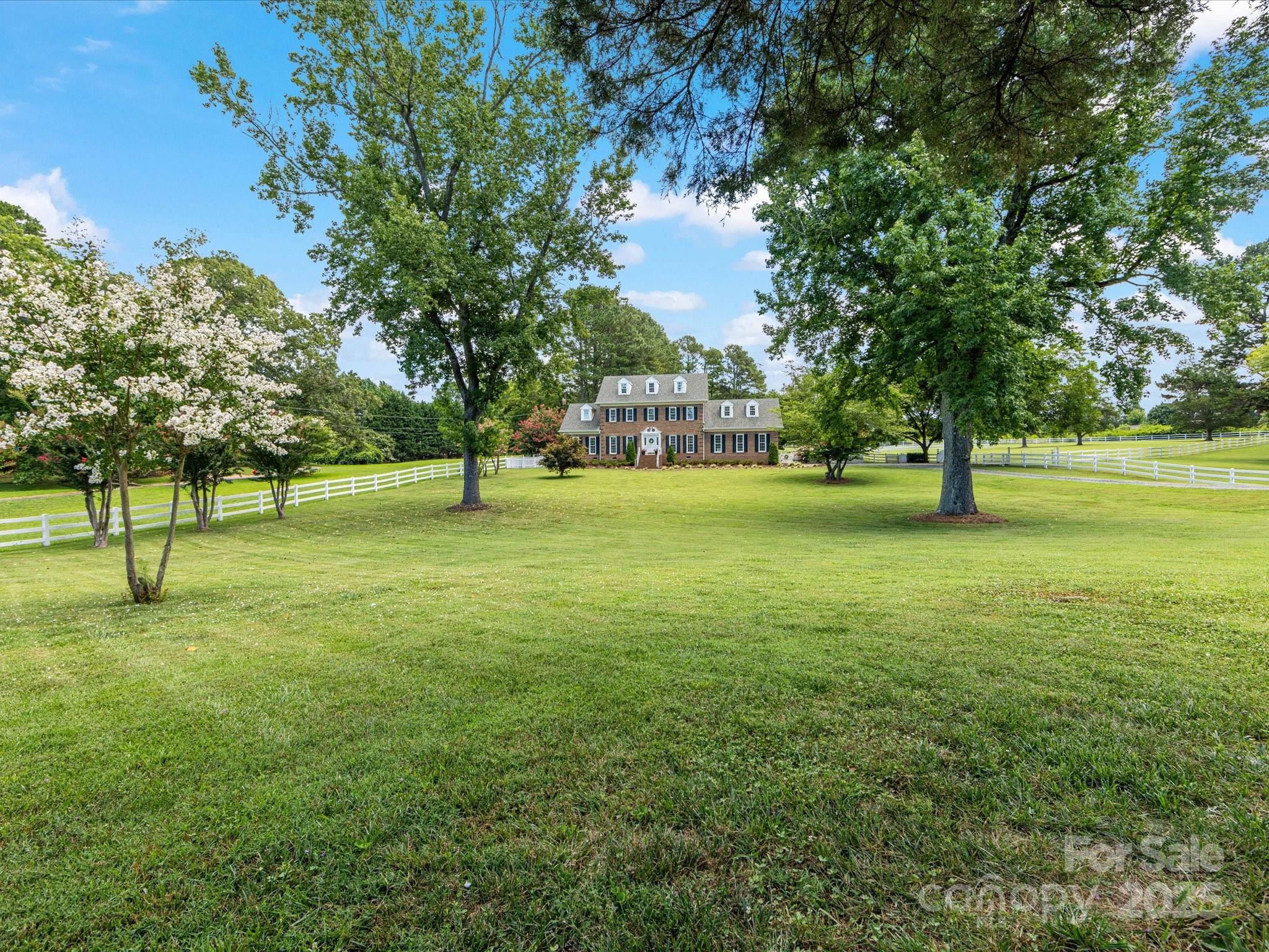 11215 Idlewild Road Matthews, NC 28105 - Photo 16 of 48 a view of an outdoor space and a yard