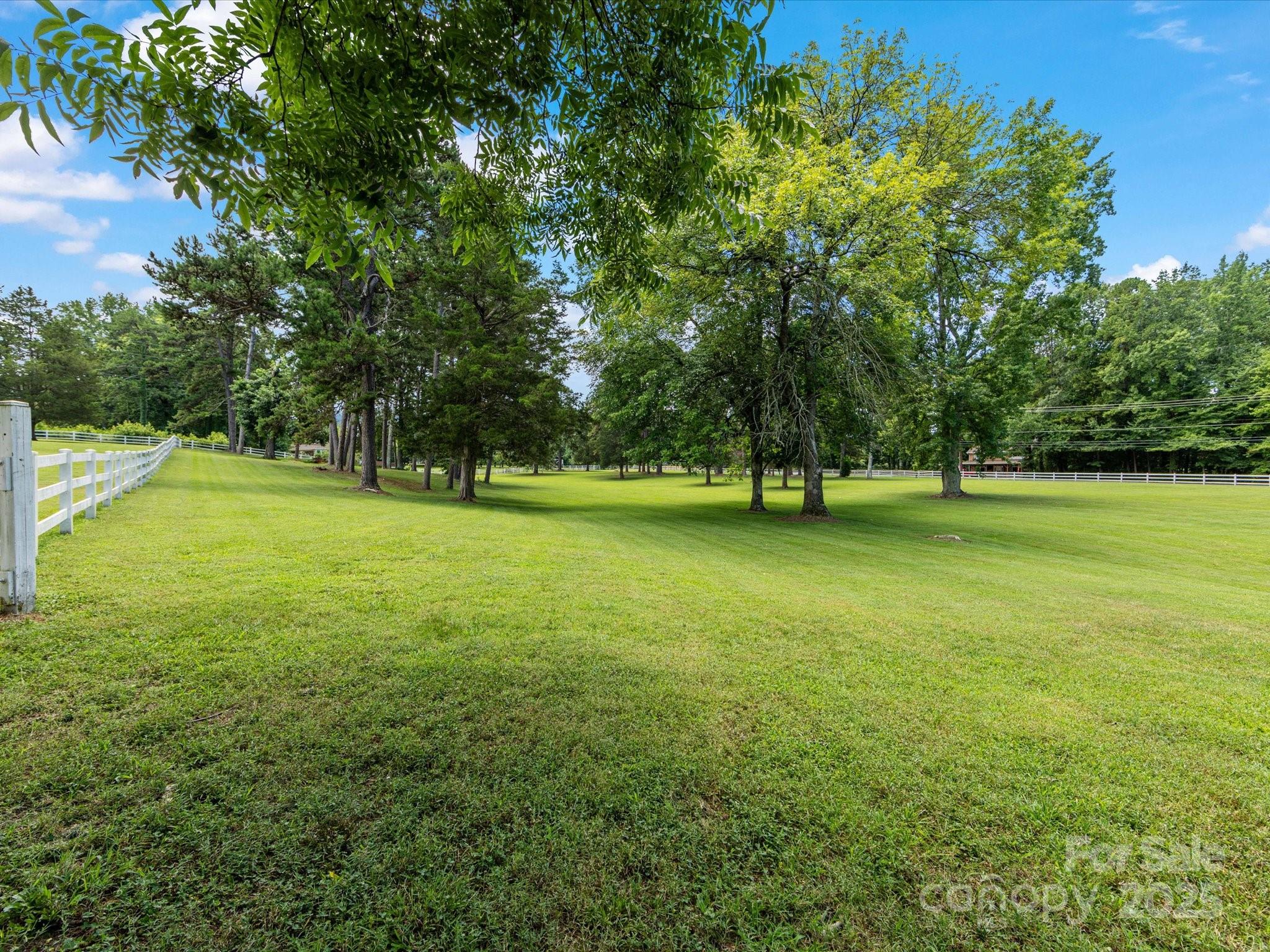 11215 Idlewild Road Matthews, NC 28105 - Photo 17 of 48 a view of outdoor space with deck and yard