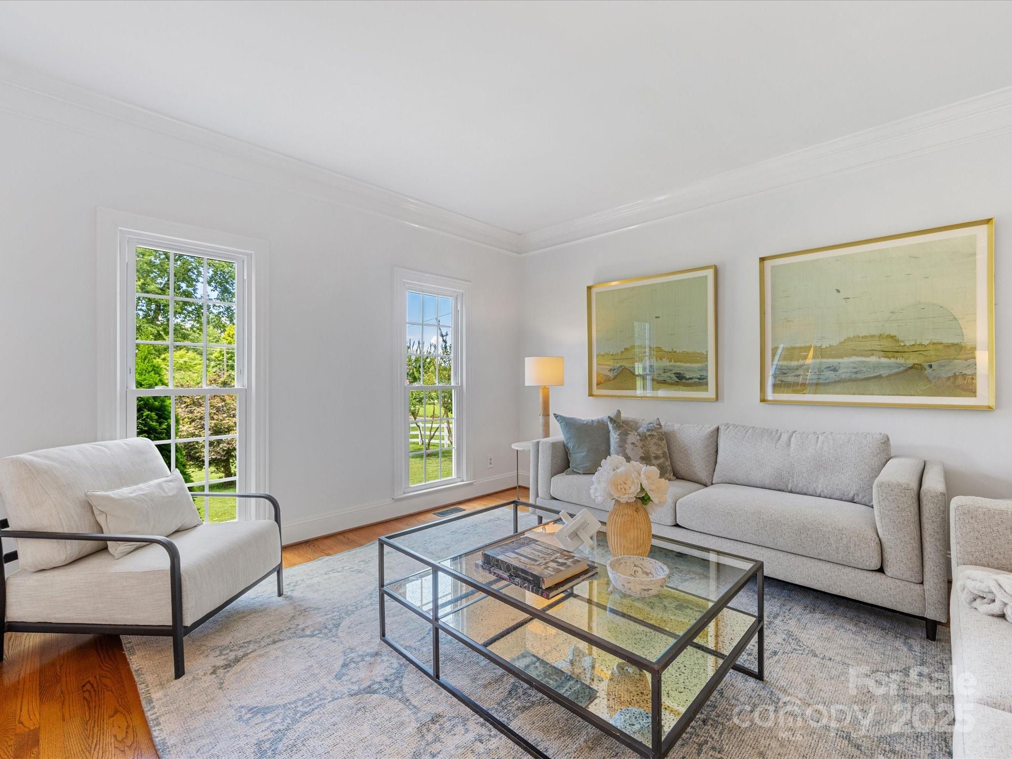 11215 Idlewild Road Matthews, NC 28105 - Photo 24 of 48 a living room with furniture and a large window