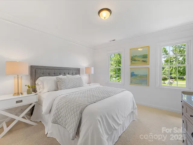 a bedroom with a bed and a desk