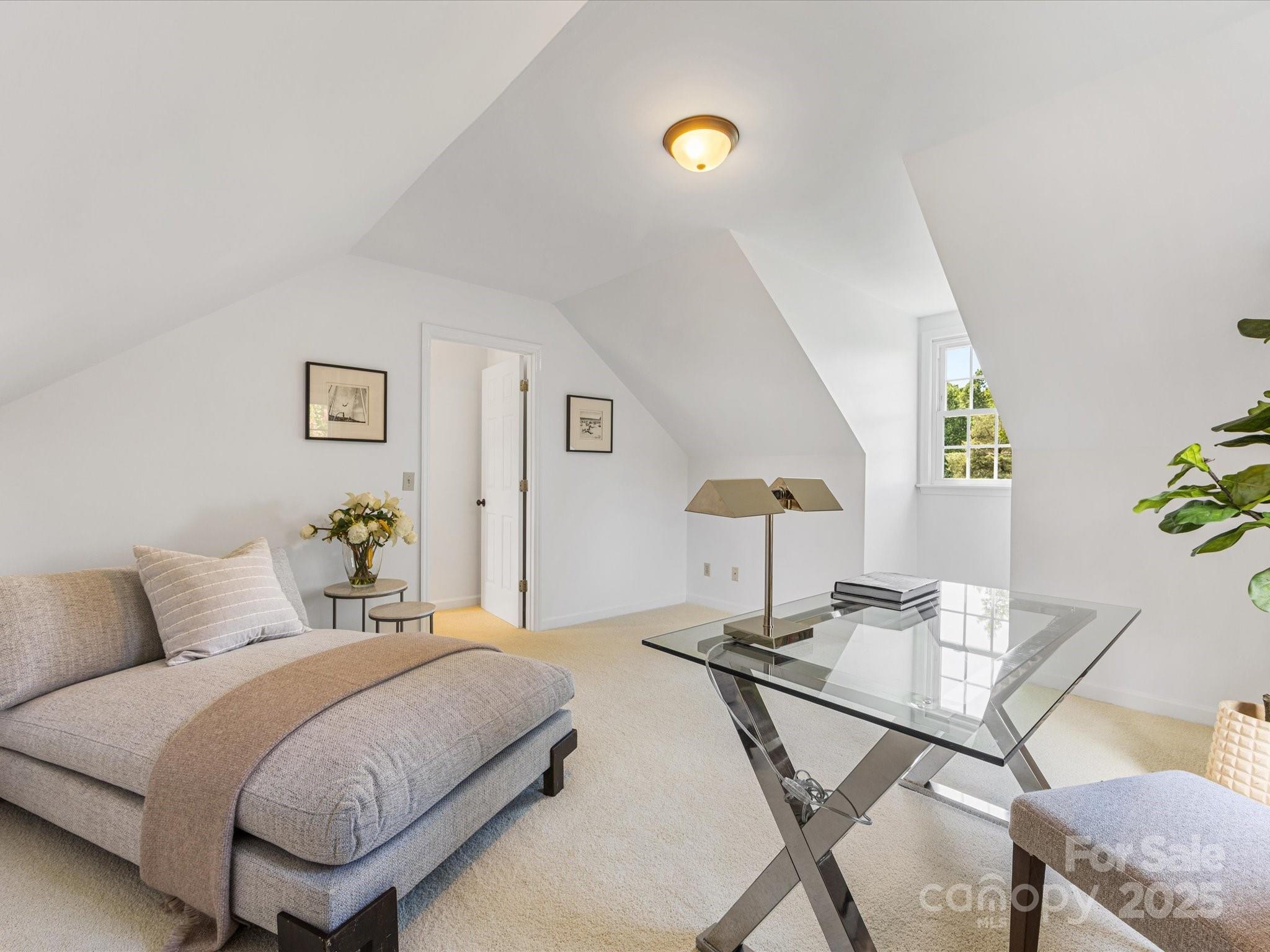 11215 Idlewild Road Matthews, NC 28105 - Photo 43 of 48 a bedroom with a bed and a desk