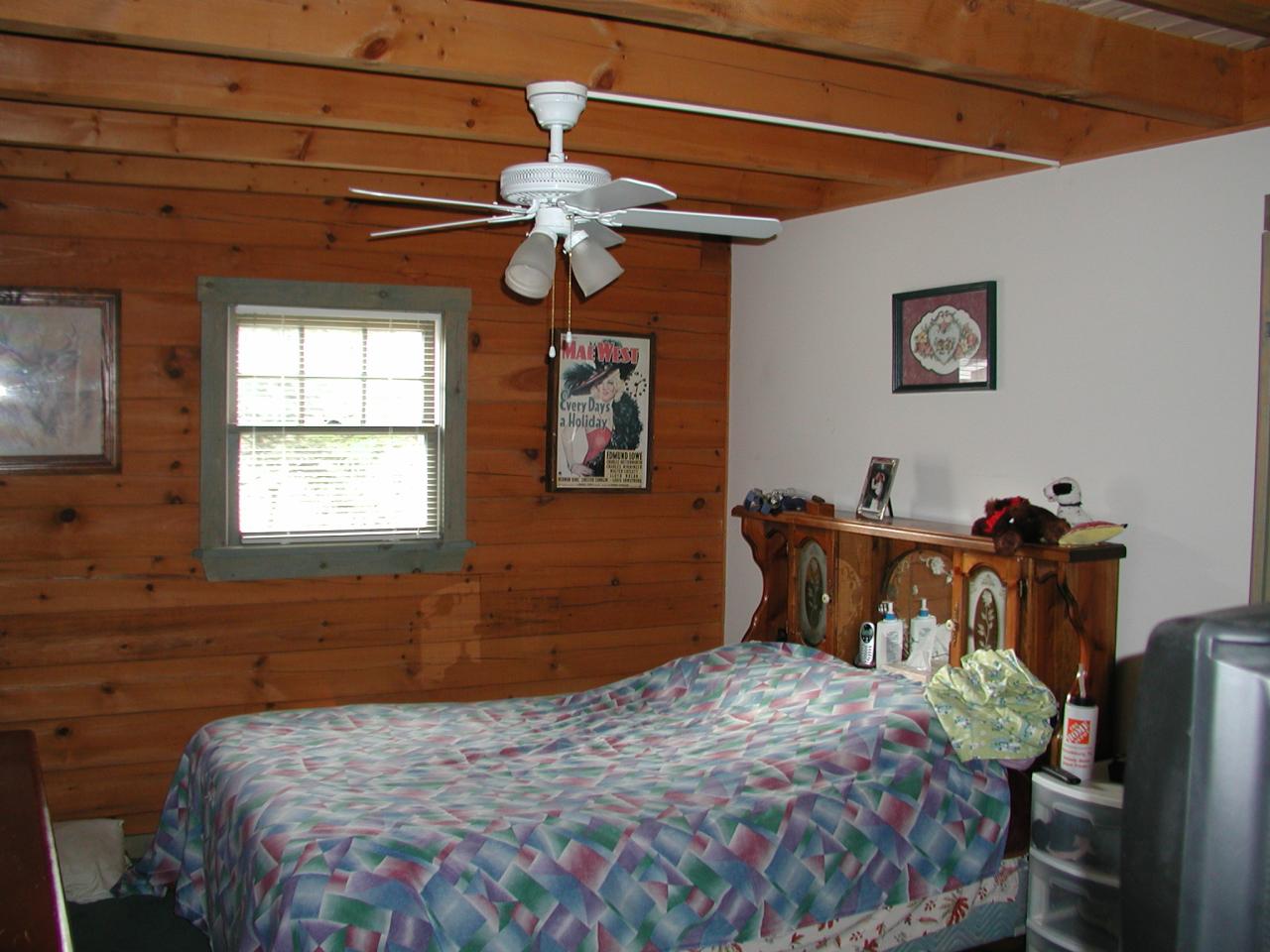 384 Green Road Tobyhanna, PA 18466 - Photo 5 of 6 a bedroom with a bed and a window
