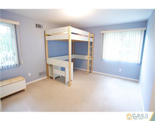 5 Beech Lane Edison, NJ 08820 - Photo 11 of 25 a bedroom with furniture and window