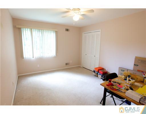 5 Beech Lane Edison, NJ 08820 - Photo 12 of 25 a view of room with toys and wooden floor