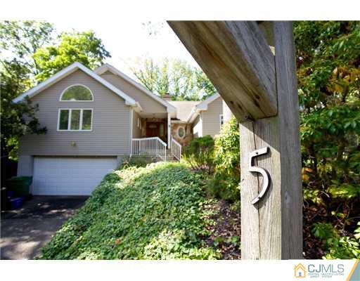 5 Beech Lane Edison, NJ 08820 - Photo 20 of 25 a front view of a house with garden