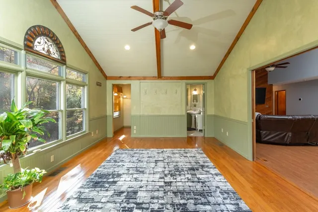 a bathroom with a large mirror