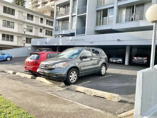 a car parked in front of a building