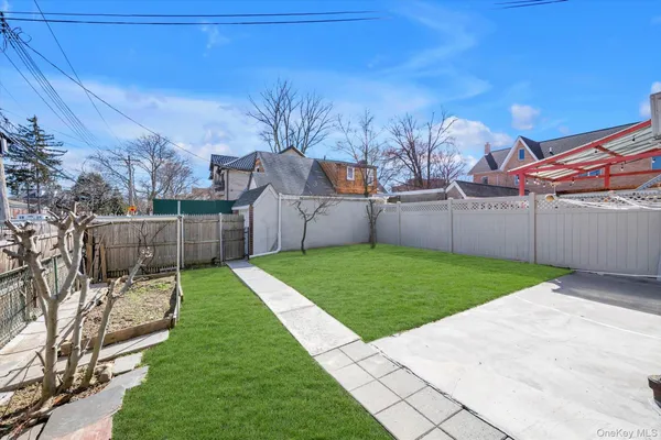 a view of a backyard with a garden
