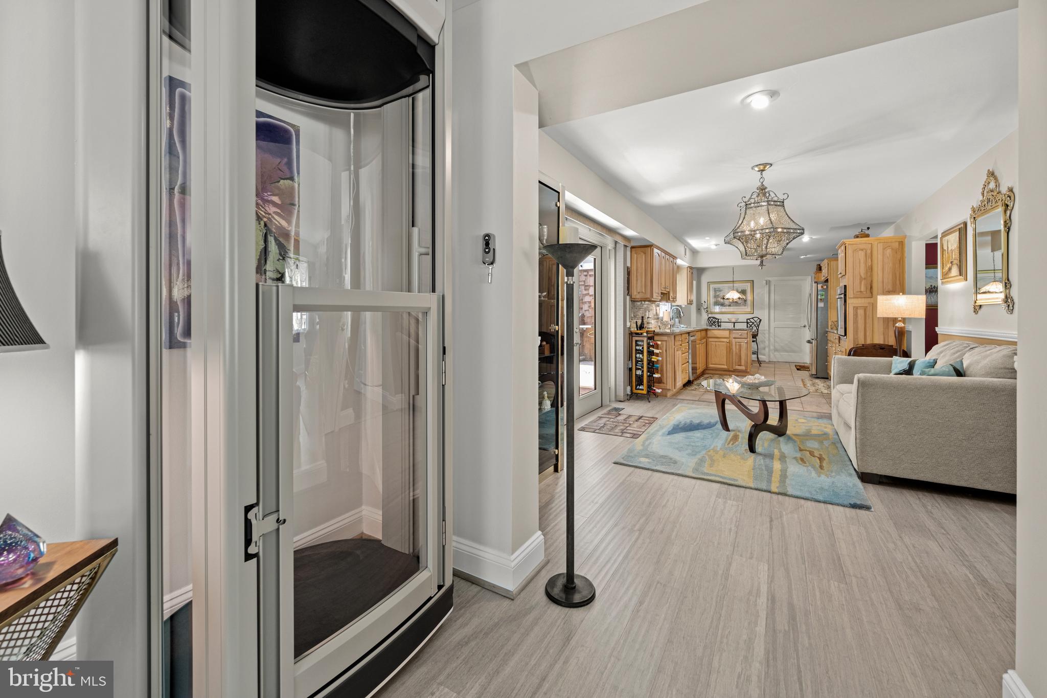 9307 Montpelier Drive Laurel, MD 20708 - Photo 11 of 69 View into Kitchen from Living Room and Elevator