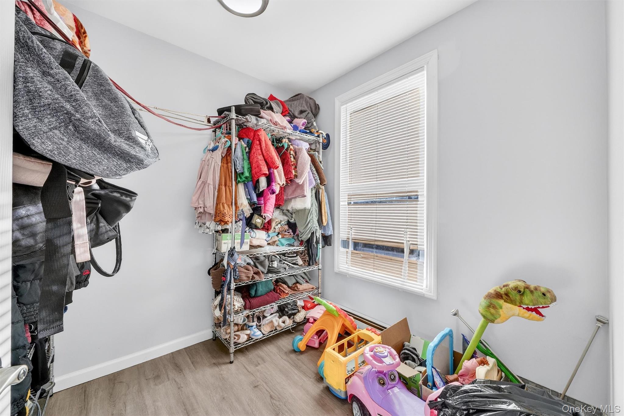 1106 Orchard Street Peekskill, NY 10566 - Photo 22 of 32 2nd FL bedroom # 3 Walk in closet featuring light wood-type flooring