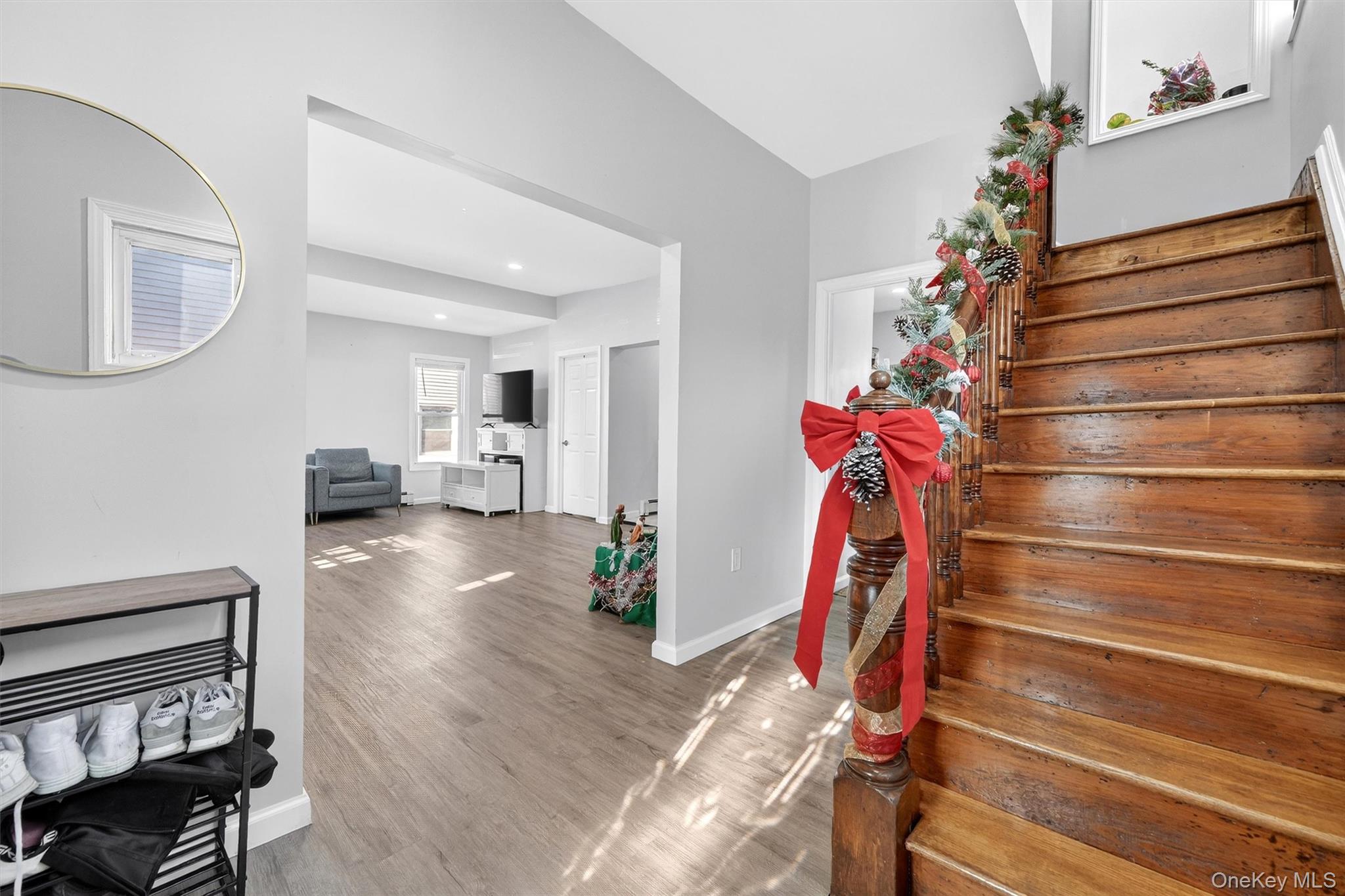 1106 Orchard Street Peekskill, NY 10566 - Photo 5 of 32 Staircase with wood finished floors and recessed lighting