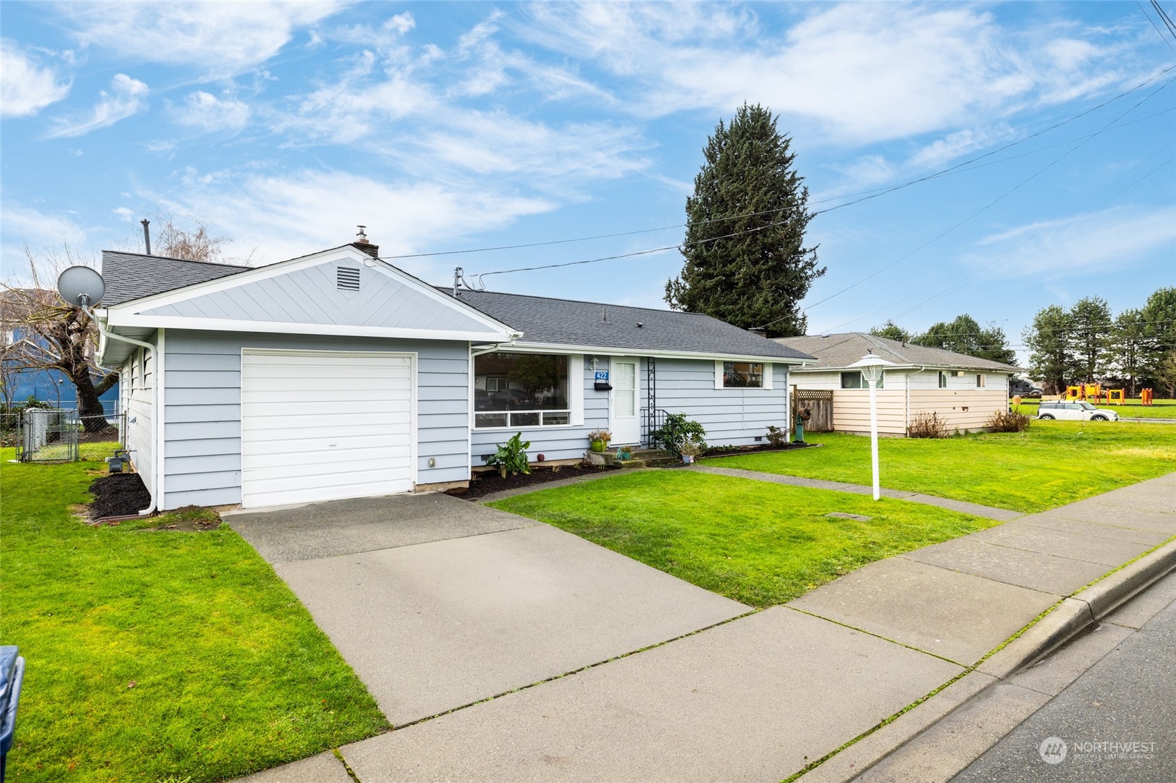 422 Simons Avenue Burlington, WA 98233 - Photo 2 of 21 a front view of a house with a yard