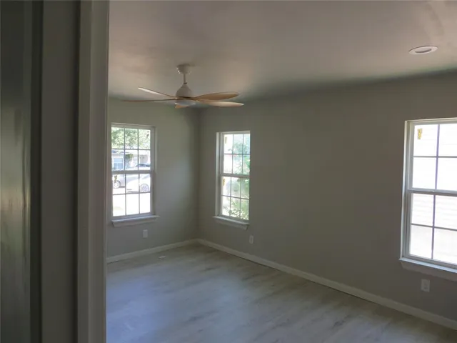 an empty room that has a window