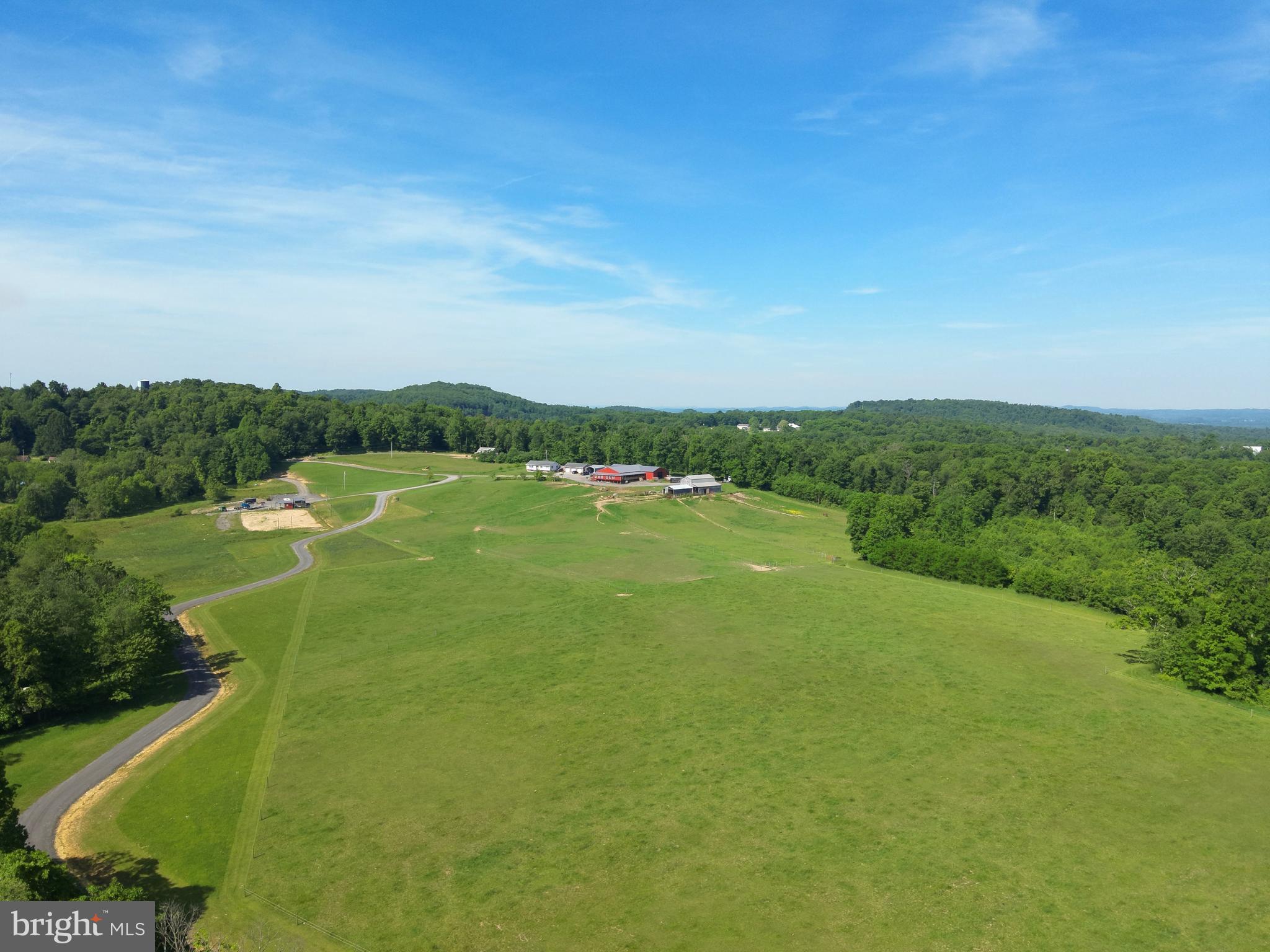 301 Dinkenberger Road Kingwood, WV 26537 - Photo 43 of 57 a view of a lake with houses in the background