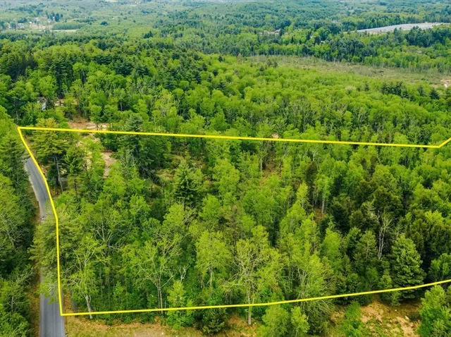 a view of a yard from a balcony