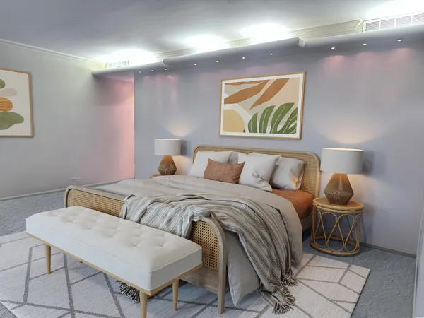 a bedroom with a bed and painting on the wall