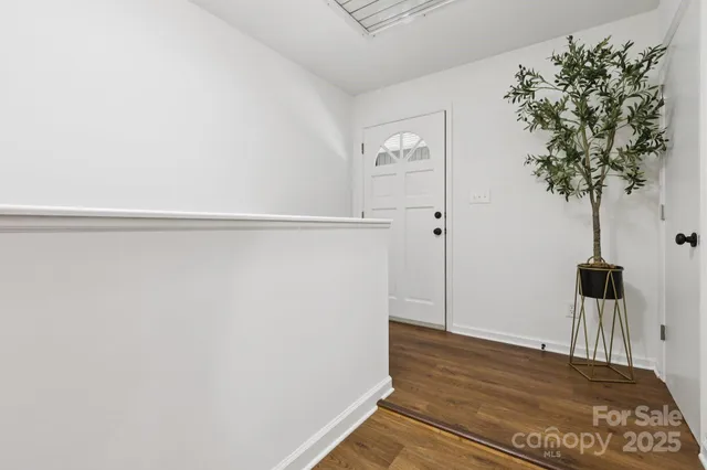 a view of a hallway with closet