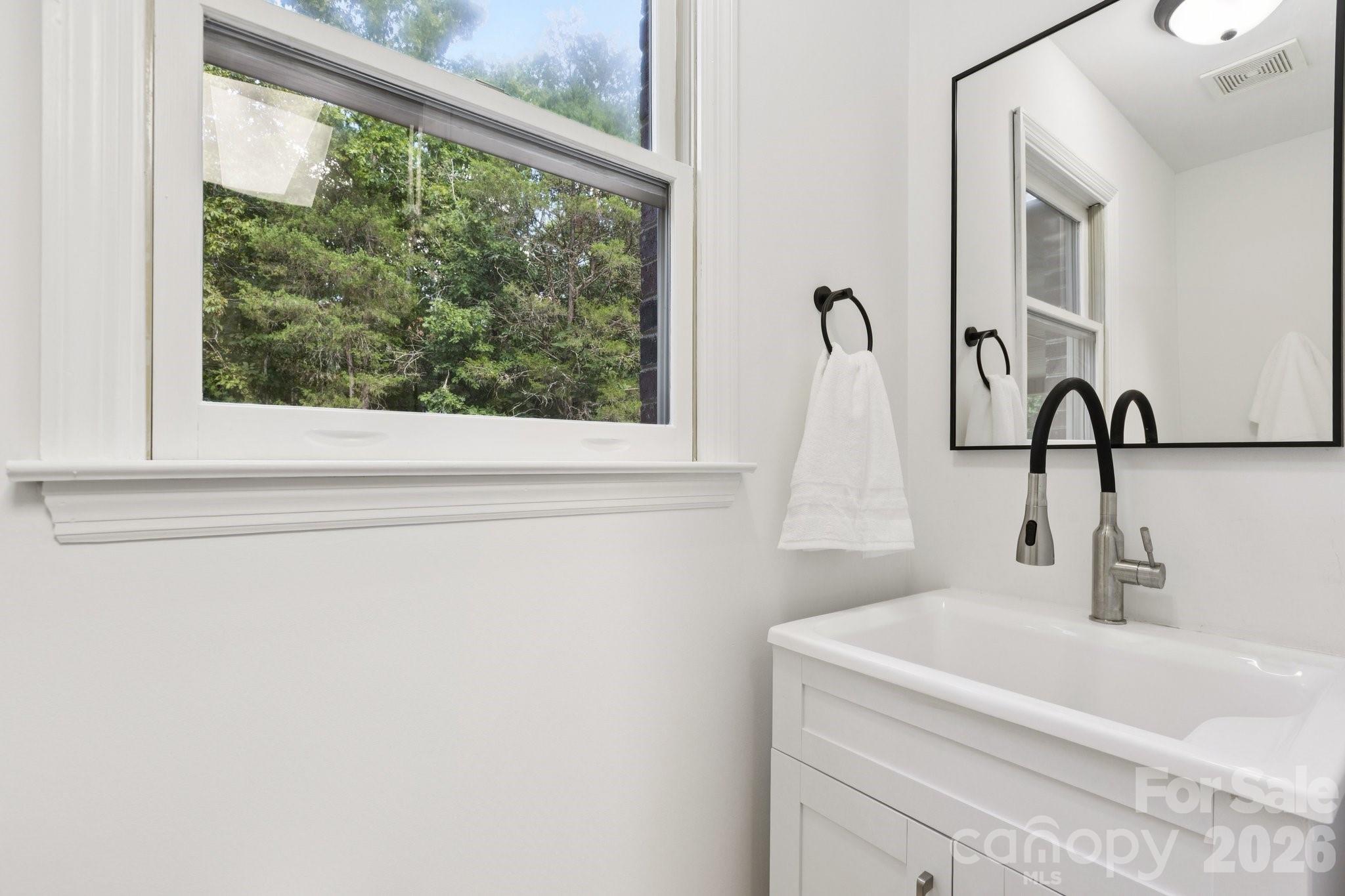 3090 Goblet Road Richburg, SC 29729 - Photo 21 of 48 a bathroom with a sink and a window
