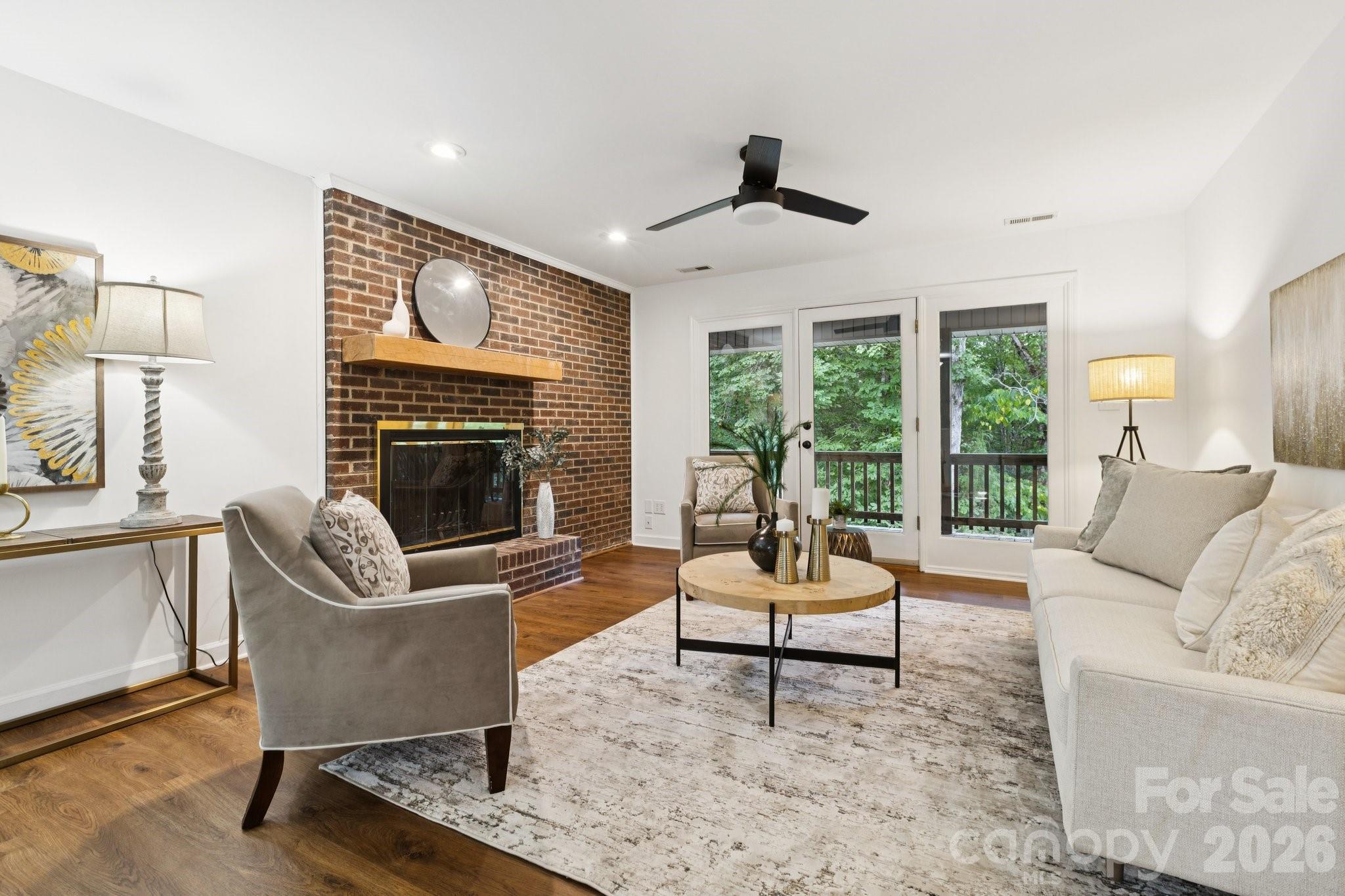 3090 Goblet Road Richburg, SC 29729 - Photo 31 of 48 a living room with furniture and a fireplace
