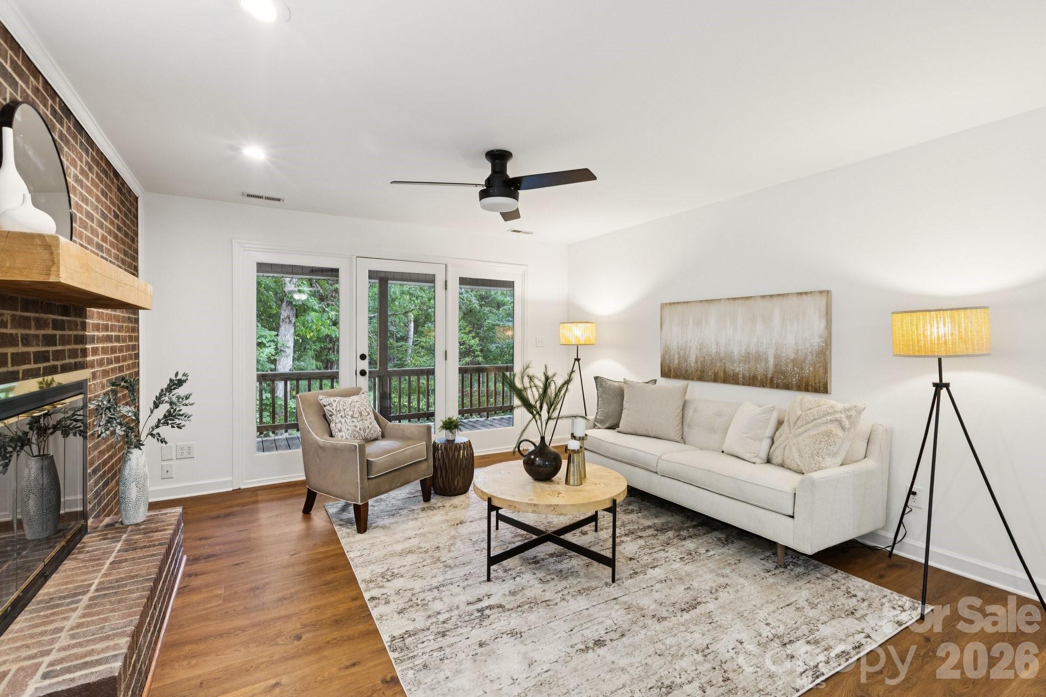 3090 Goblet Road Richburg, SC 29729 - Photo 32 of 48 a living room with furniture and a fireplace