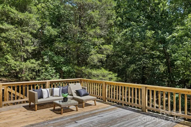 a view of balcony with furniture