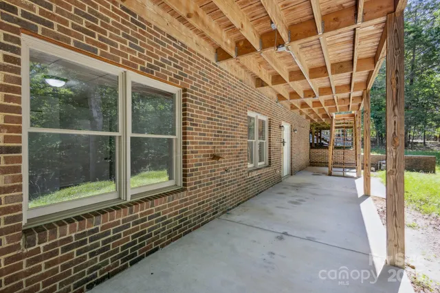 a view of a porch with a bench