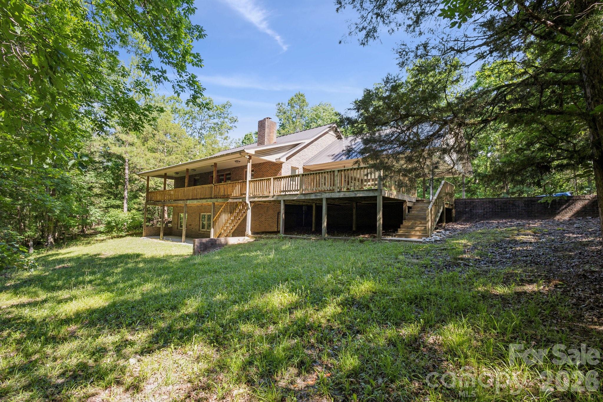 3090 Goblet Road Richburg, SC 29729 - Photo 4 of 48 a view of a house with a backyard