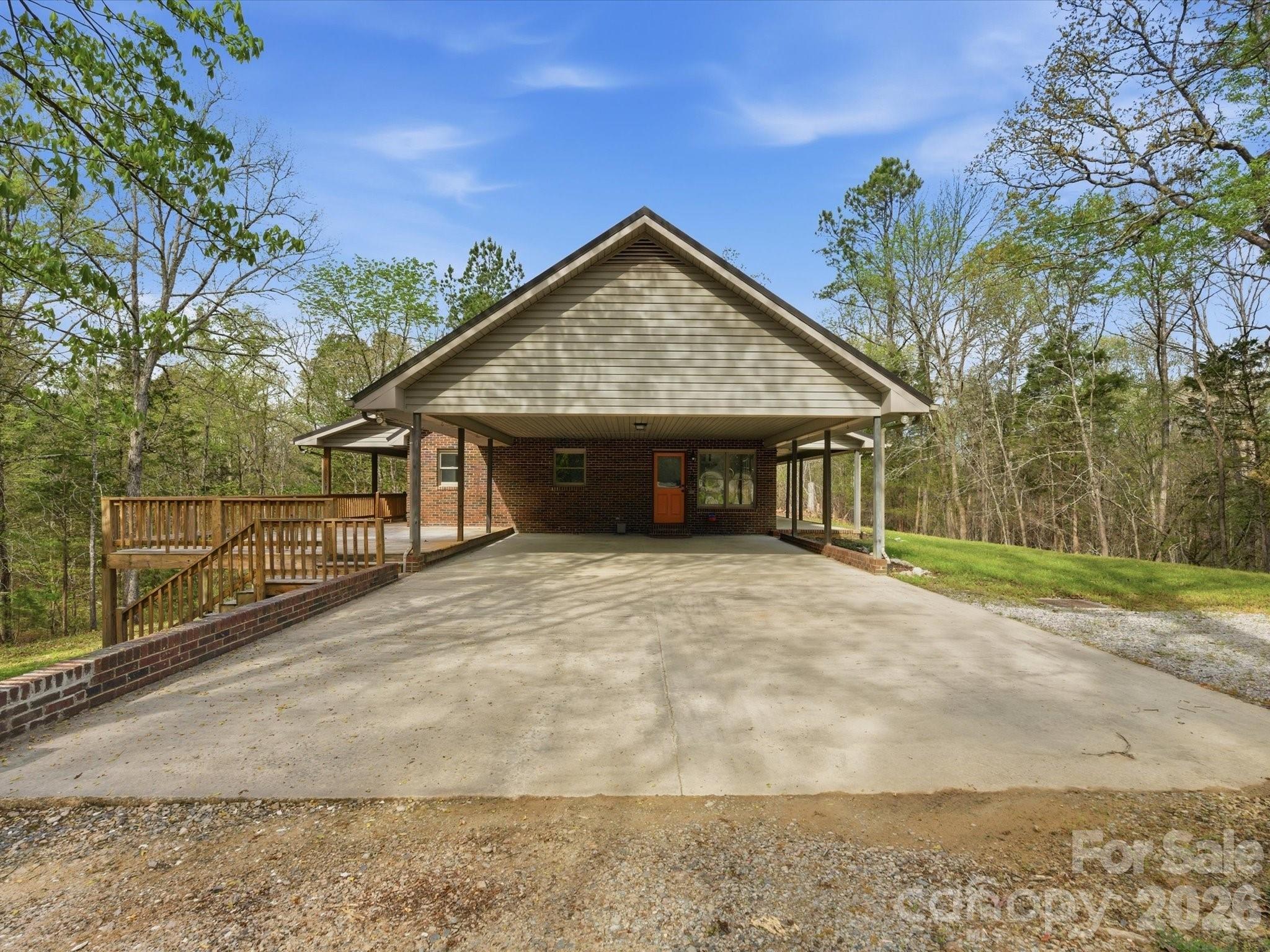 3090 Goblet Road Richburg, SC 29729 - Photo 7 of 48 a view of a house with backyard and trees