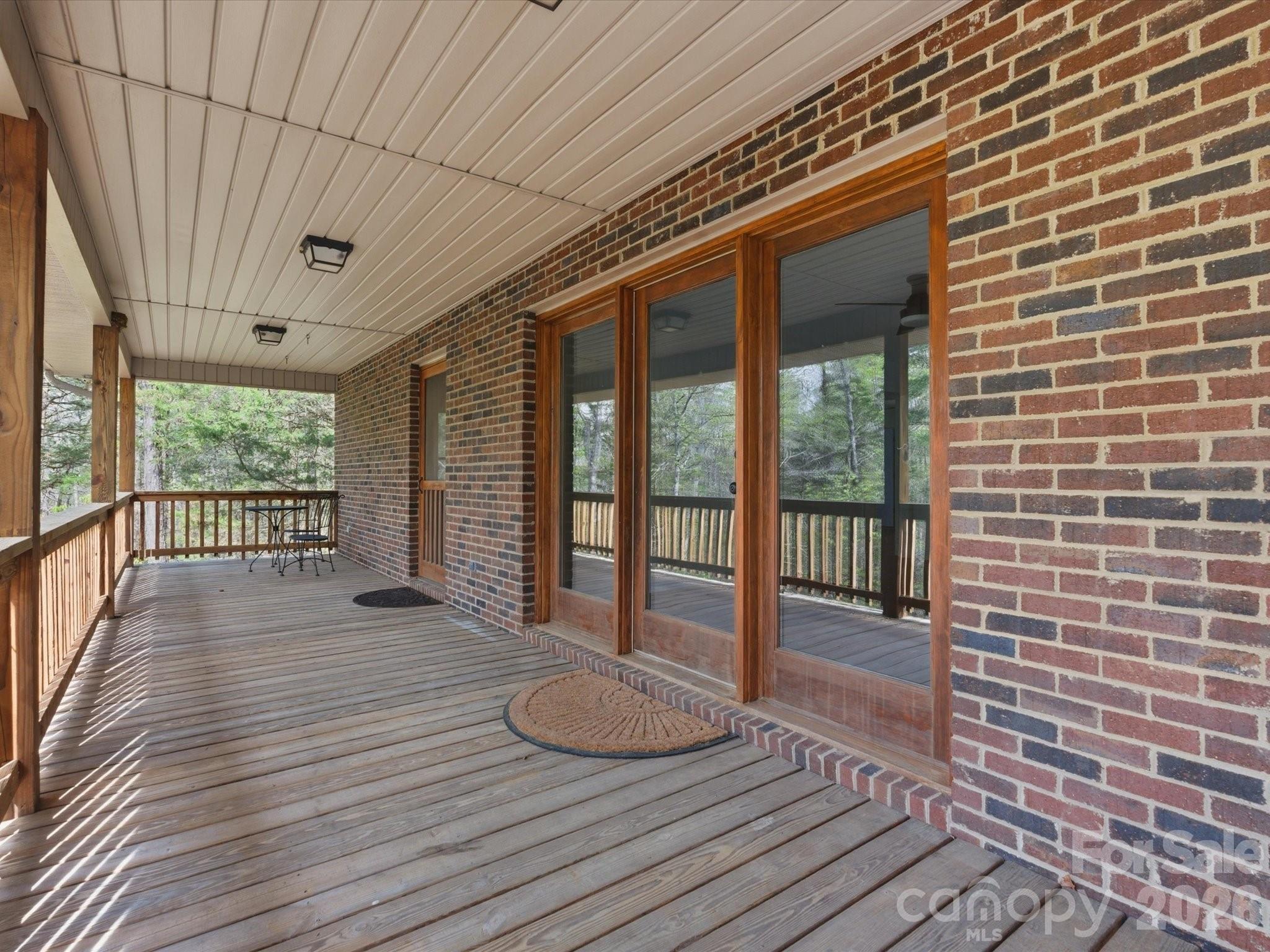 3090 Goblet Road Richburg, SC 29729 - Photo 9 of 48 a view of a room with wooden floor and iron stairs