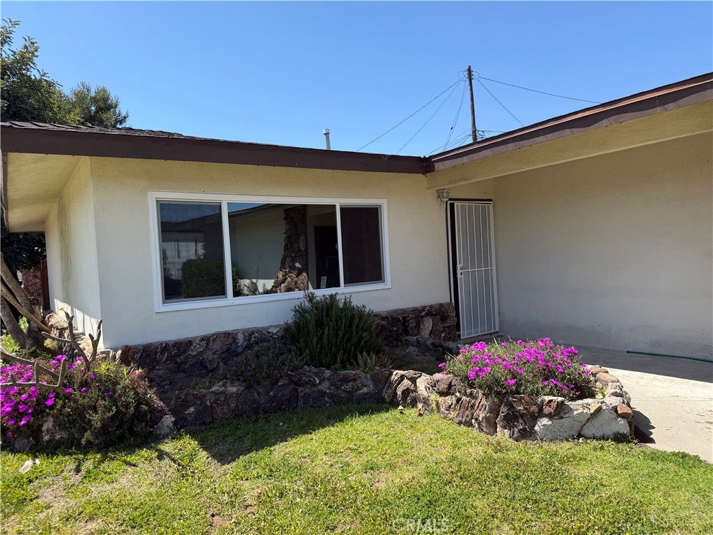 717 Naramore Way Redondo Beach, CA 90278 - Photo 1 of 16 a front view of a house with plants
