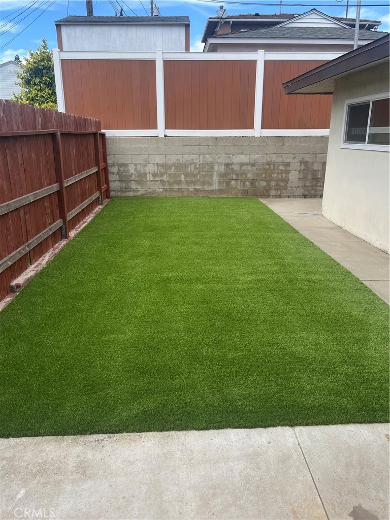 717 Naramore Way Redondo Beach, CA 90278 - Photo 14 of 16 a view of a backyard