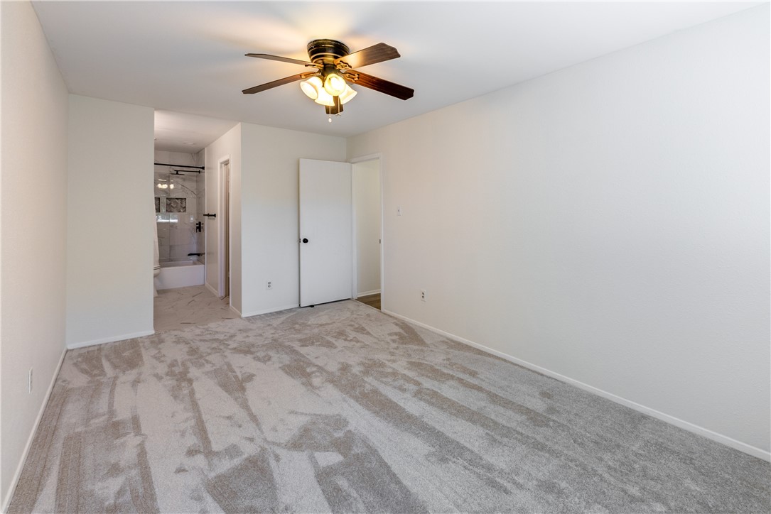 12702 Rhea Court Austin, TX 78727 - Photo 13 of 19 Primary bed and bath up