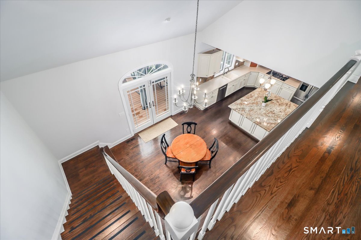 8 Encampment Place Ridgefield, CT 06877 - Photo 19 of 40 Looking from Second Floor into Eat In Kitchen