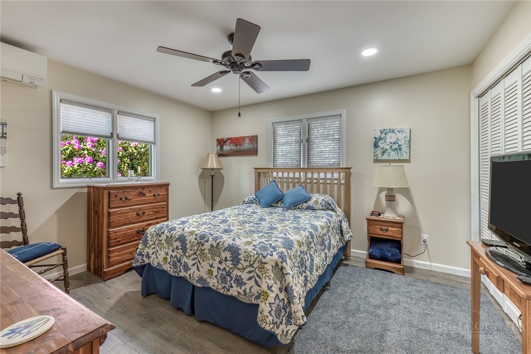 174 Spruce Pine Road Newland, NC 28657 - Photo 18 of 50 a bedroom with a bed and a tv on the dresser