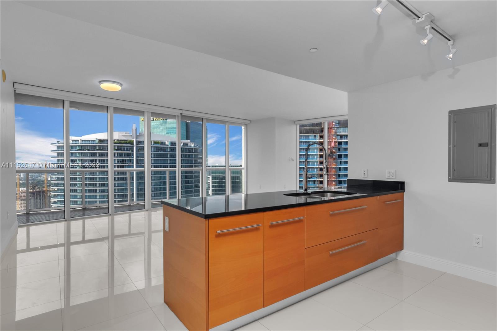 465 Brickell Avenue, Unit 5002 Miami, FL 33131 - Photo 15 of 26 a view of a kitchen with a large window