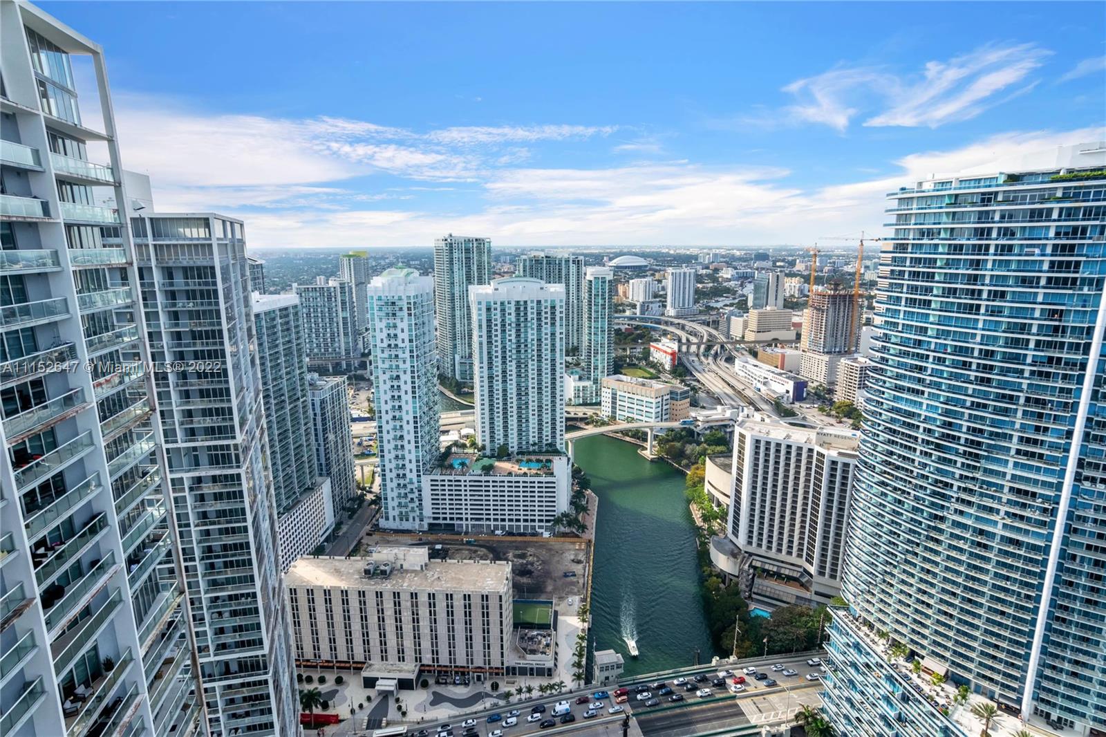 465 Brickell Avenue, Unit 5002 Miami, FL 33131 - Photo 2 of 26 a view of a city with tall buildings