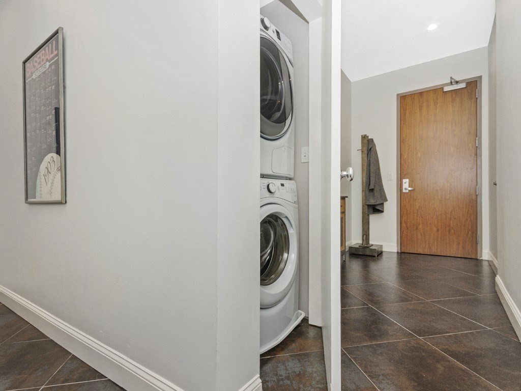346 Congress Street, Unit 302 Boston, MA 02210 - Photo 18 of 22 a view of a storage & utility room with washer and dryer