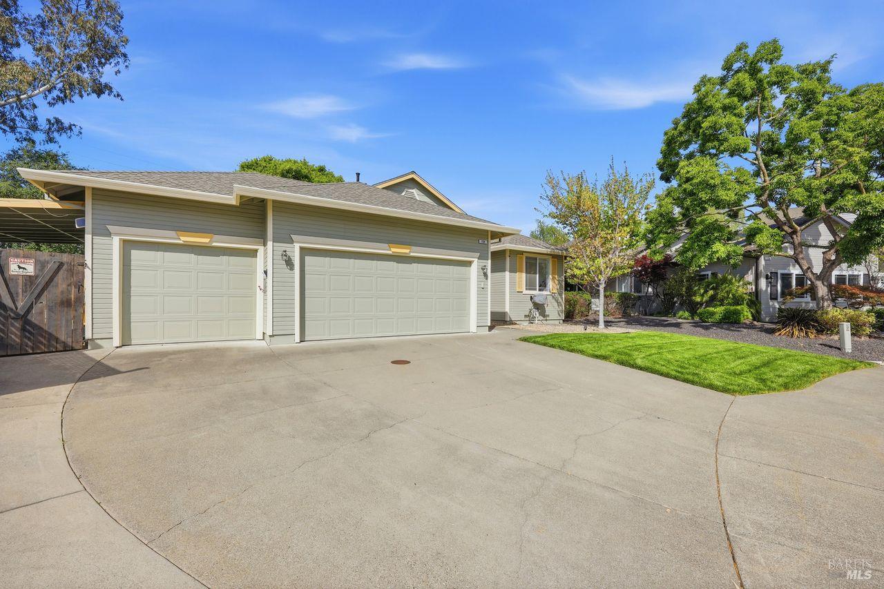 164 Fulton Place Windsor, CA 95492 - Photo 2 of 50 front view of a house with a yard and garage