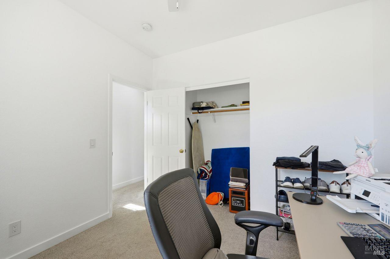 164 Fulton Place Windsor, CA 95492 - Photo 24 of 50 a view of a workspace with furniture and clutter