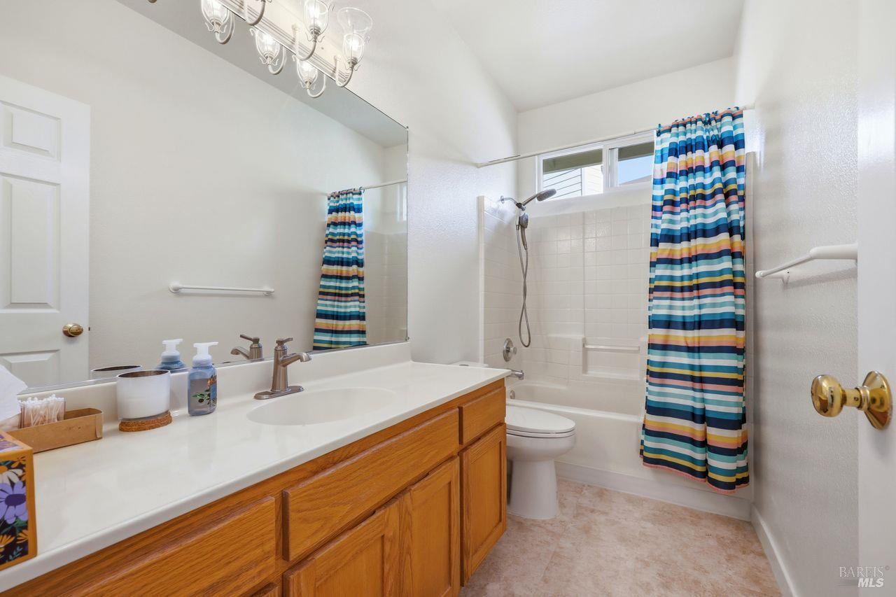 164 Fulton Place Windsor, CA 95492 - Photo 25 of 50 a bathroom with a sink a toilet and shower